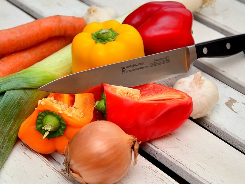 Diabetes education Townsville Knife cutting fresh vegetables